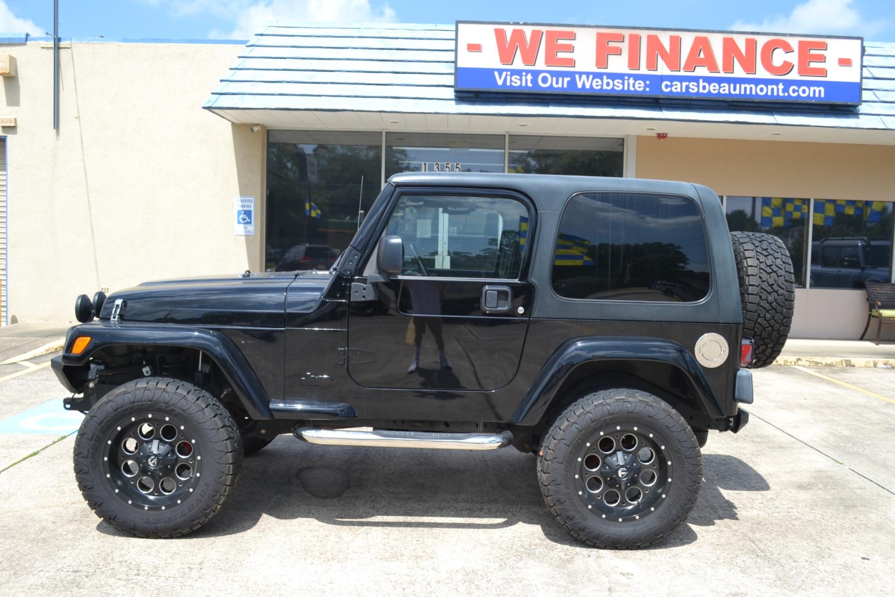 2003 BLACK /BLACK Jeep Wrangler X (1J4FA39S13P) with an 4.0L L6 OHV 12V engine, 4-Speed Automatic | 5-Speed Manual transmission, located at 1355 North 11th Street, Beaumont, 77702, (409) 832-0006, 30.094290, -94.130096 - Photo #1